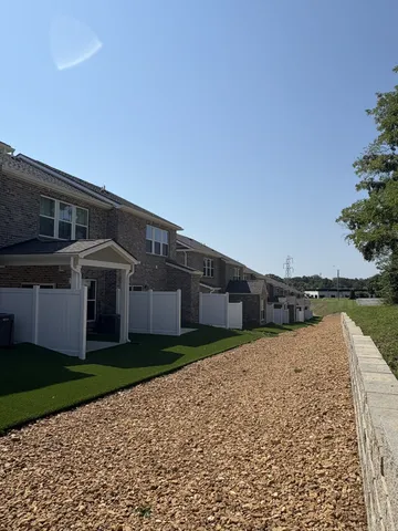 a house view with a garden space