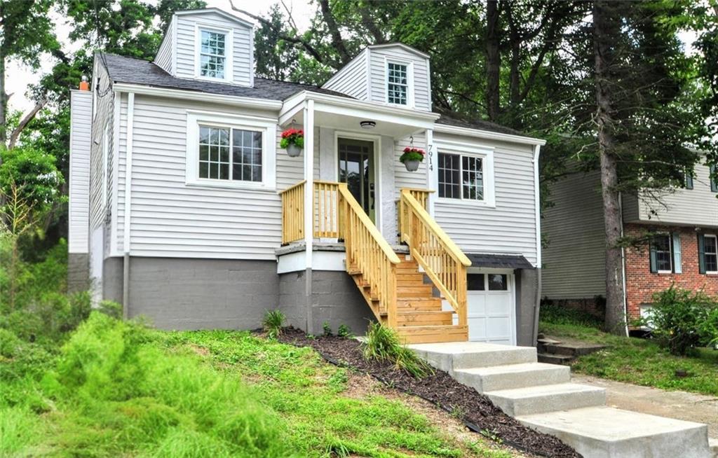 7914 Hemlock Street Pittsburgh, PA 15237 - Photo 1 of 37 a front view of a house with a yard