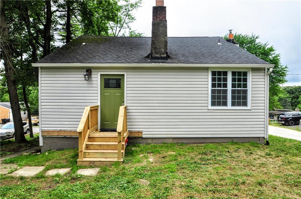7914 Hemlock Street Pittsburgh, PA 15237 - Photo 2 of 37 front view of a house with a yard