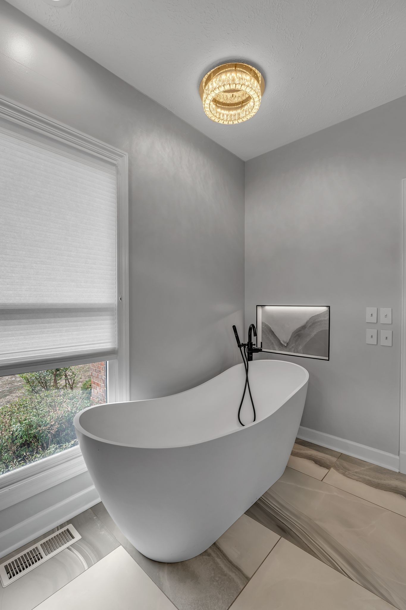 2103 Liebengood Road Goodlettsville, TN 37072 - Photo 56 of 97 a white tub sitting next to a window