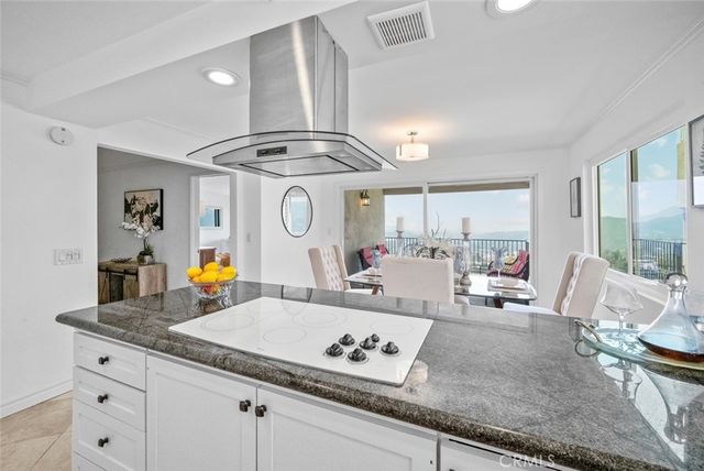 a living room with granite countertop furniture and a large window