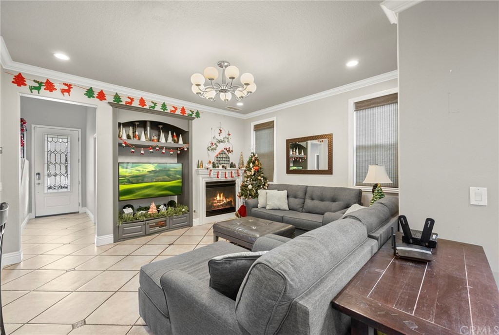 845 Dans Place Brea, CA 92821 - Photo 4 of 31 a living room with furniture and a flat screen tv