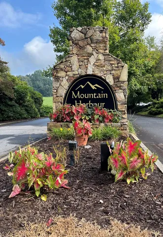 a view of outdoor space with garden and flowers