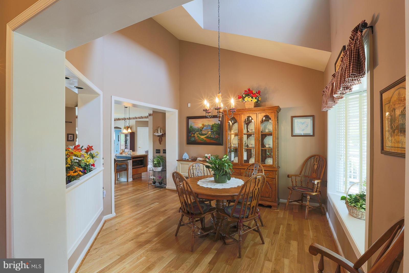 5020 Forge Road Perry Hall, MD 21128 - Photo 16 of 30 a view of a dining room with furniture and a chandelier