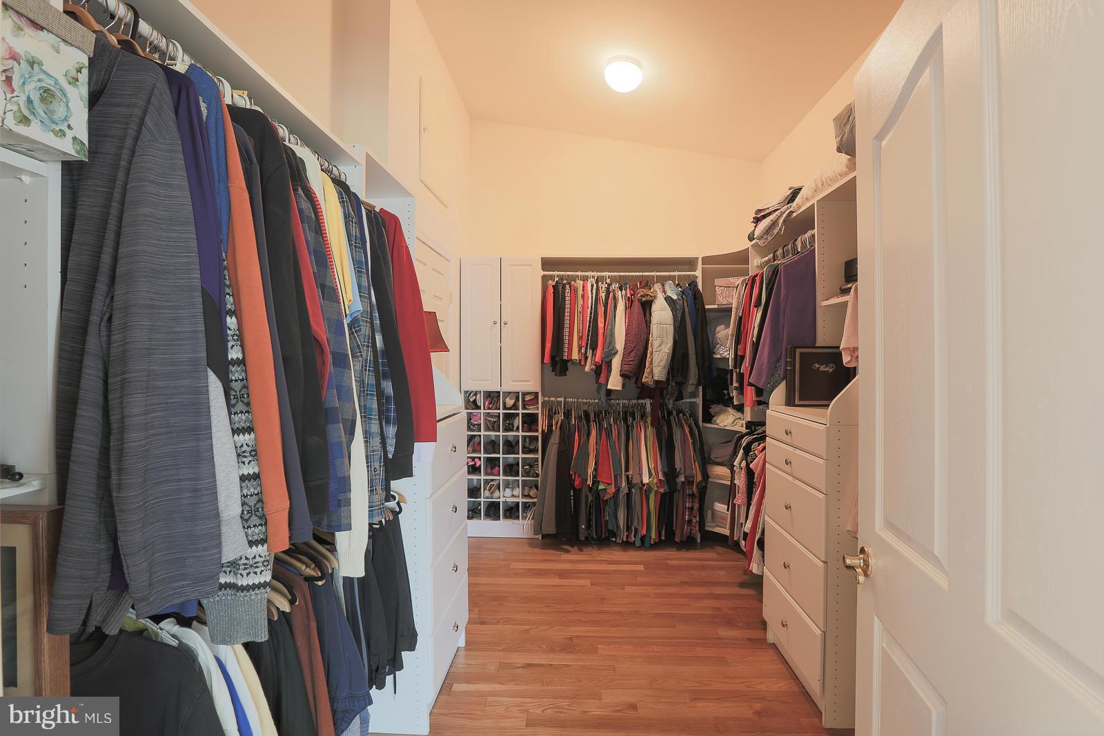5020 Forge Road Perry Hall, MD 21128 - Photo 23 of 30 a view of walk in closet with clothes and shoes