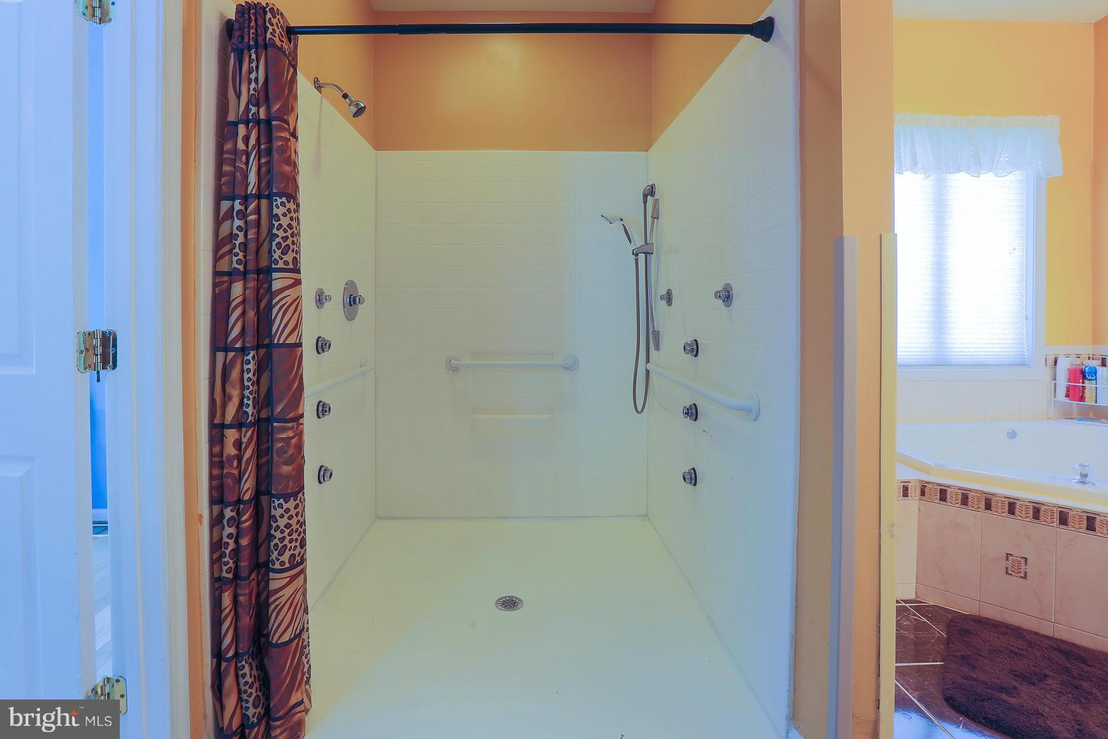5020 Forge Road Perry Hall, MD 21128 - Photo 25 of 30 a bathroom with a bathtub and shower
