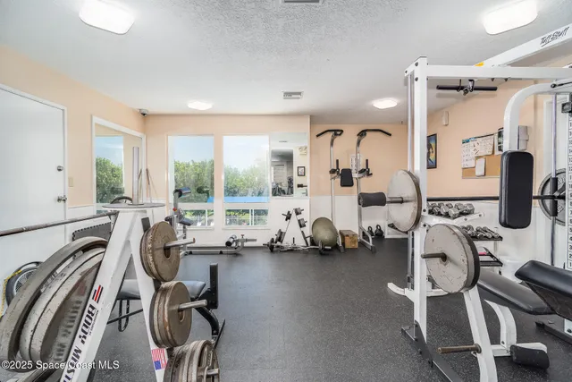 a view of a room with gym equipment