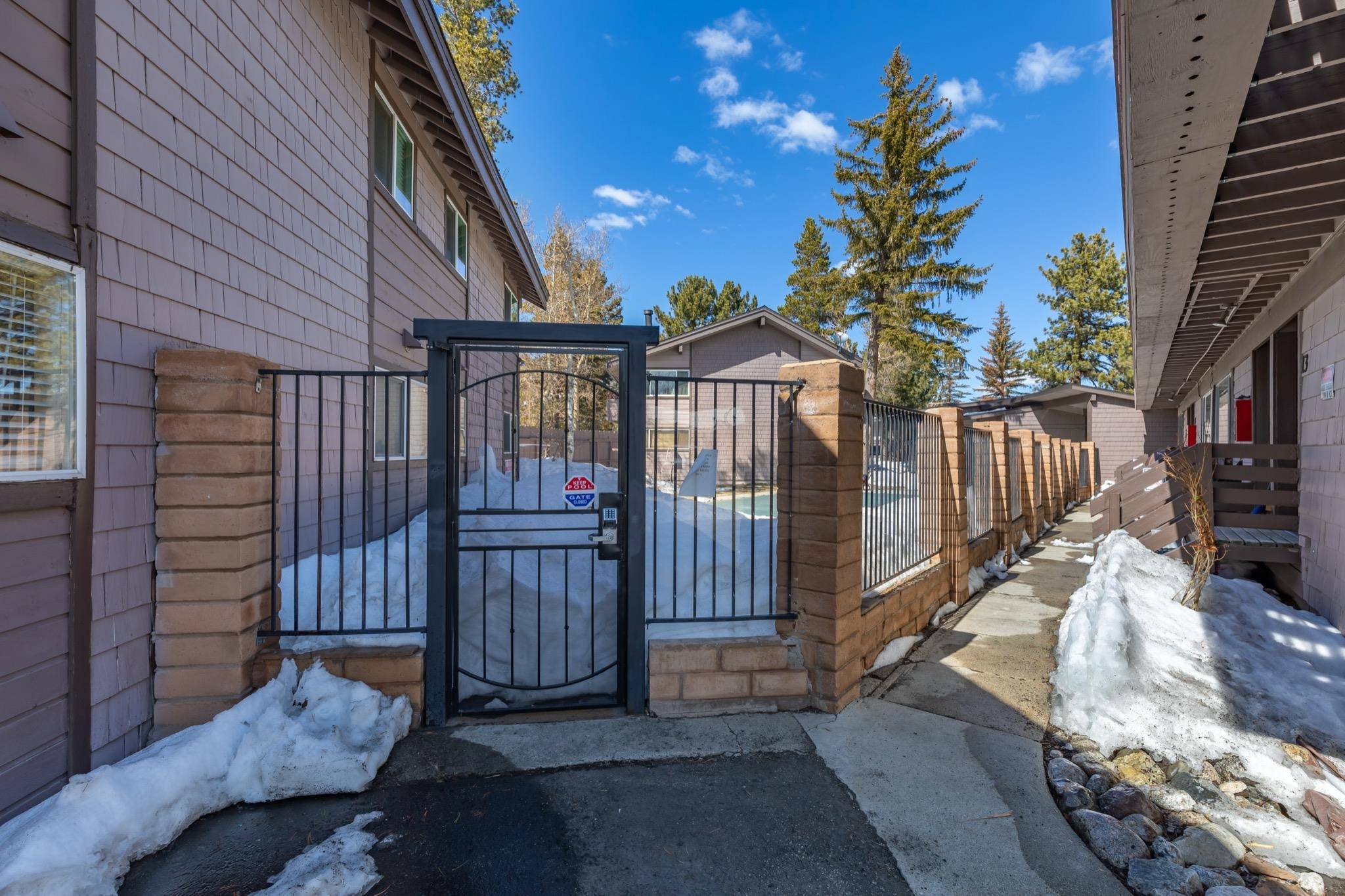 165 Old Mammoth Road, Unit 13 Mammoth Lakes, CA 93546 - Photo 21 of 23 Brown shingle siding and dark trim