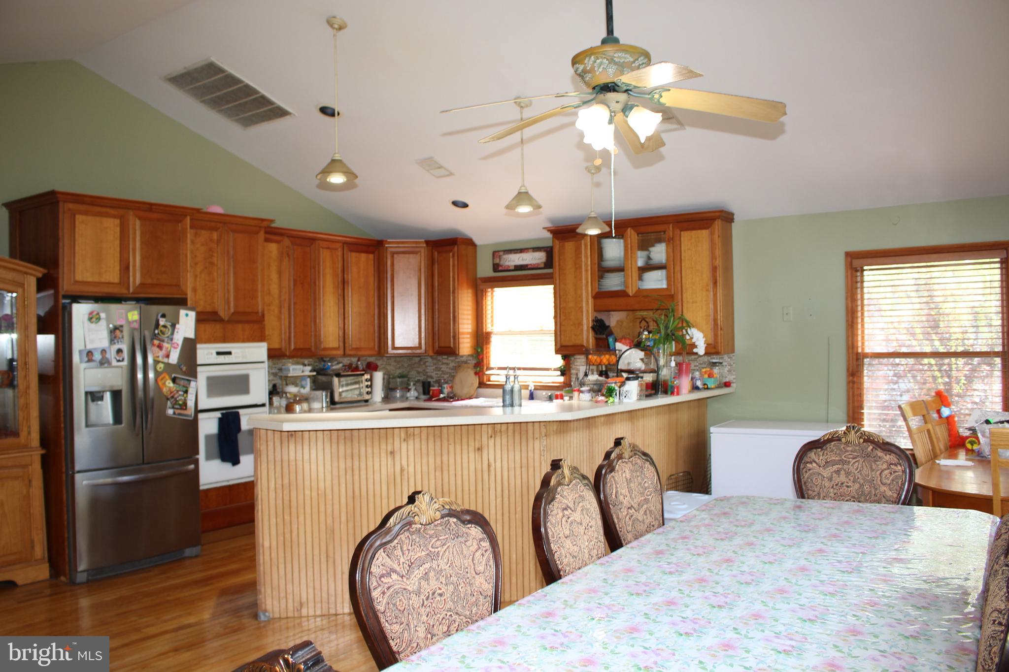 80 Chews Landing Road Clementon, NJ 08021 - Photo 12 of 50 a kitchen with stainless steel appliances granite countertop a stove refrigerator and cabinets