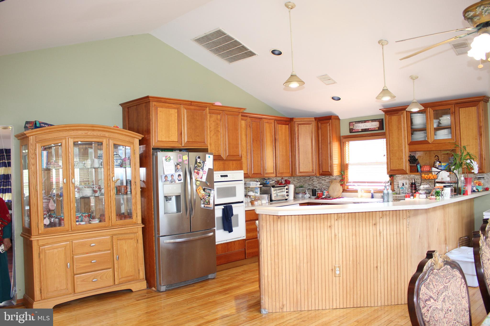 80 Chews Landing Road Clementon, NJ 08021 - Photo 13 of 50 a kitchen with stainless steel appliances granite countertop a refrigerator and a stove