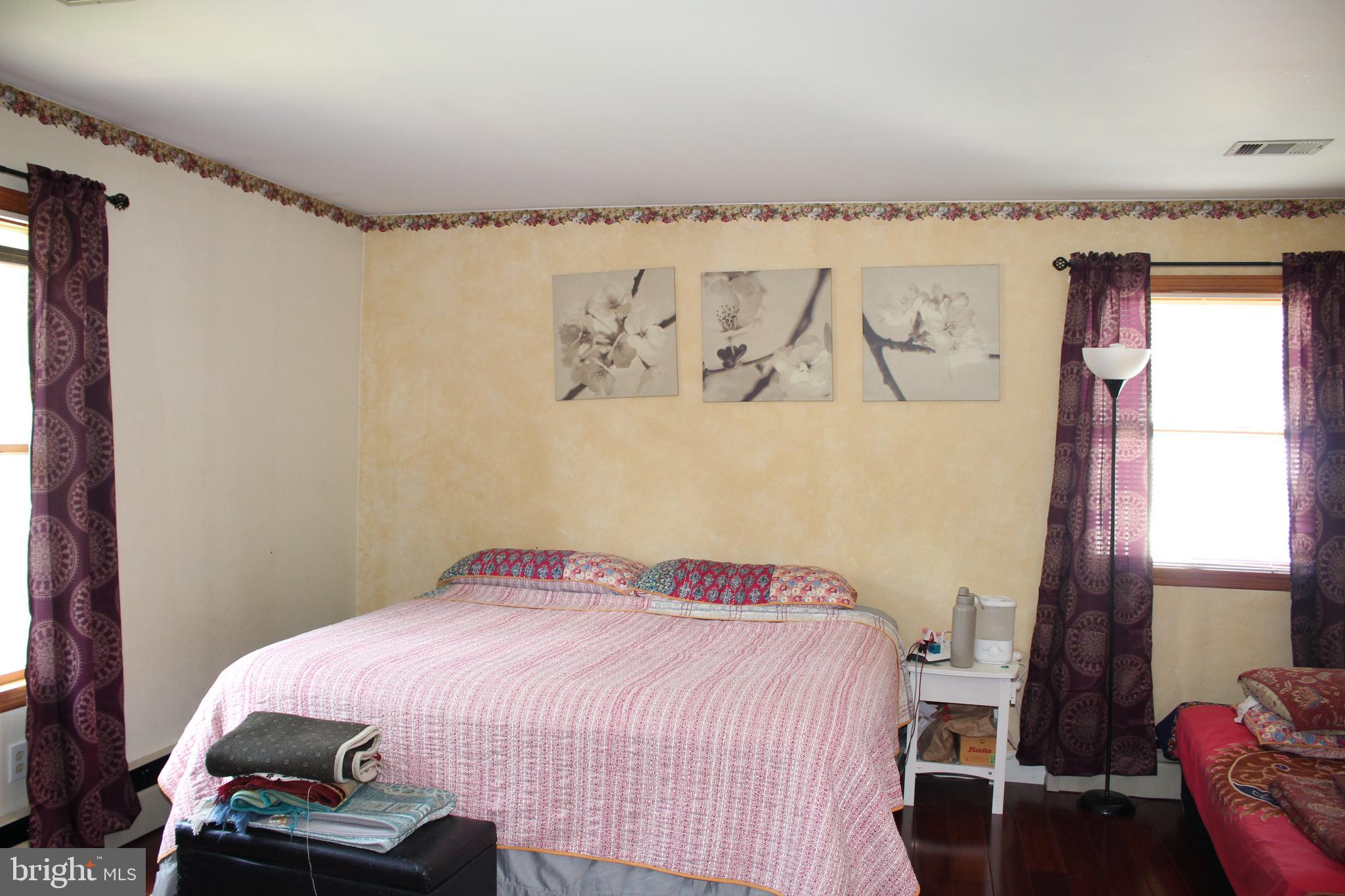 80 Chews Landing Road Clementon, NJ 08021 - Photo 17 of 50 a bedroom with a bed and a window