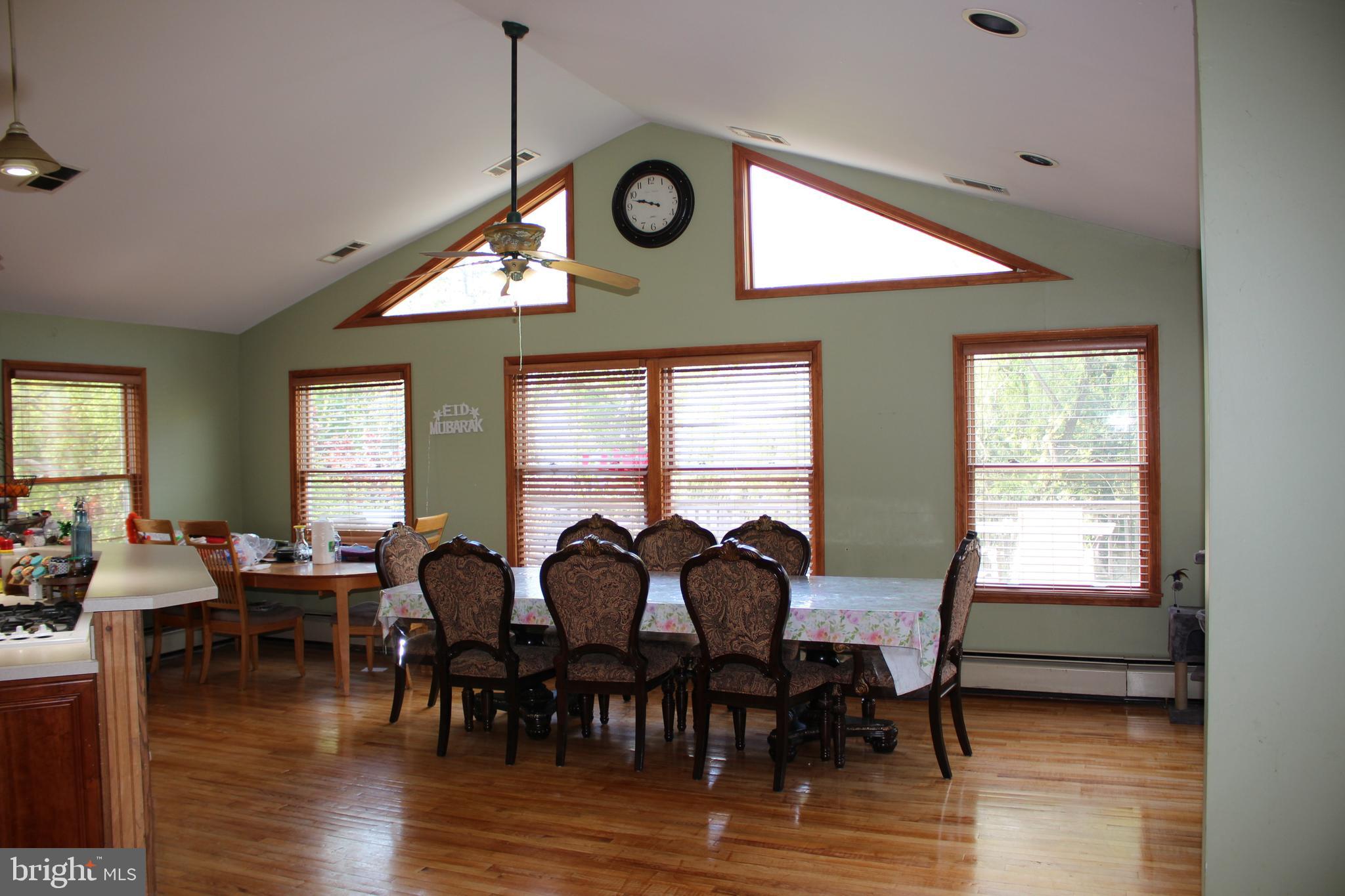 80 Chews Landing Road Clementon, NJ 08021 - Photo 21 of 50 a view of a dining room with furniture window and wooden floor
