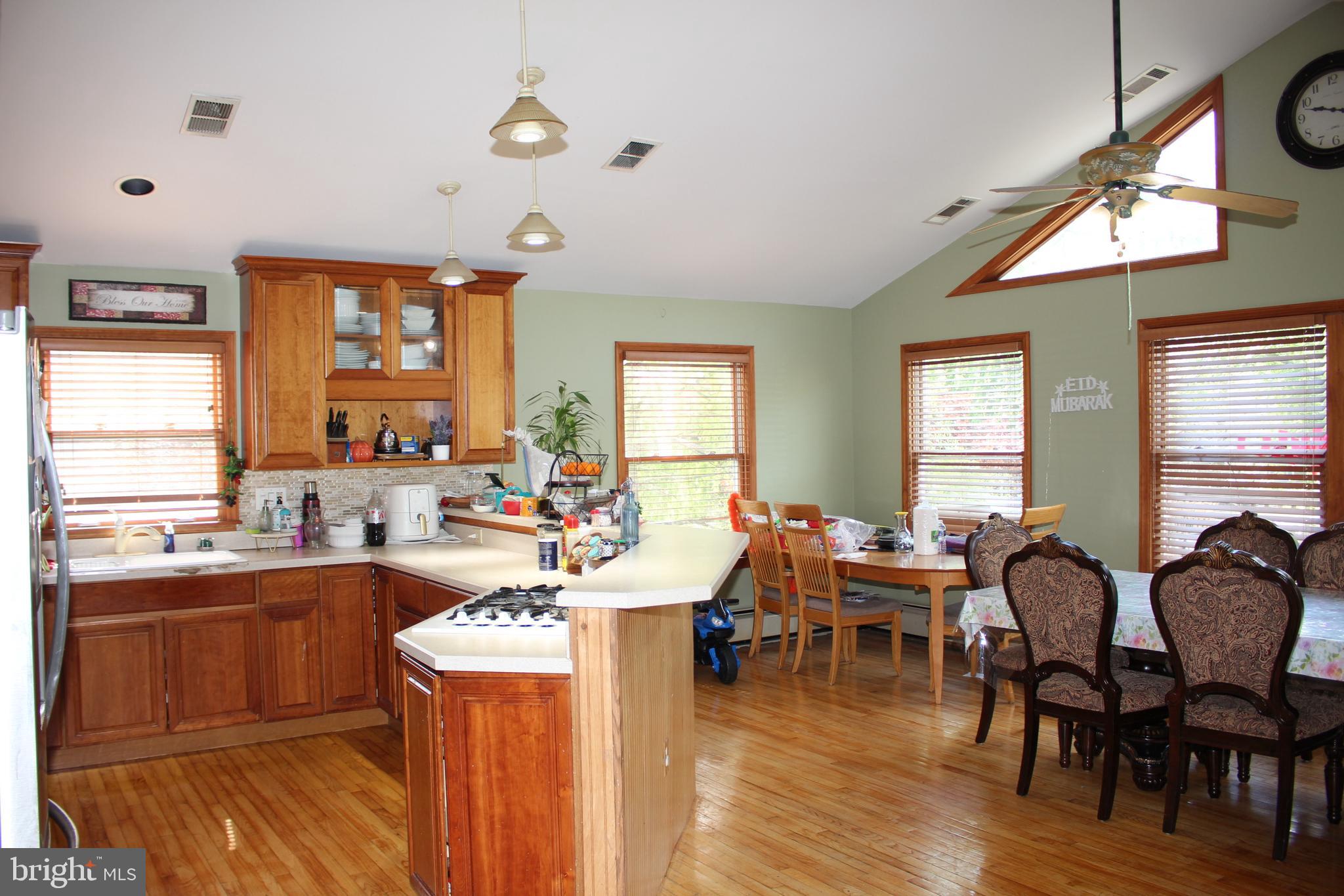 80 Chews Landing Road Clementon, NJ 08021 - Photo 23 of 50 a view of a dining room with furniture window and wooden floor