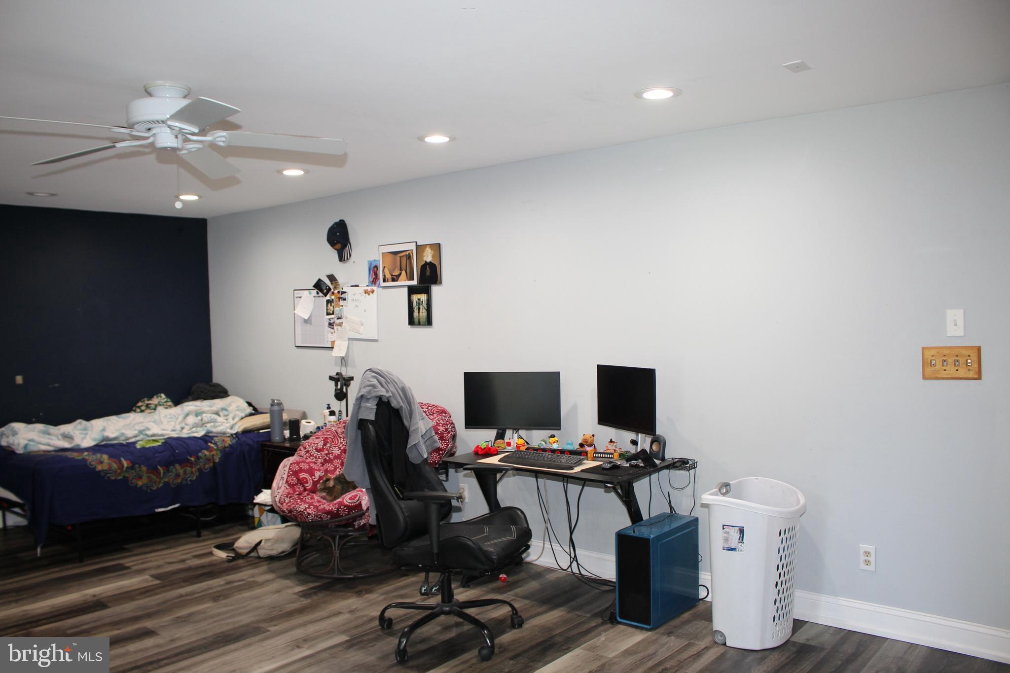 80 Chews Landing Road Clementon, NJ 08021 - Photo 30 of 50 a view of a workspace with furniture and a flat screen tv