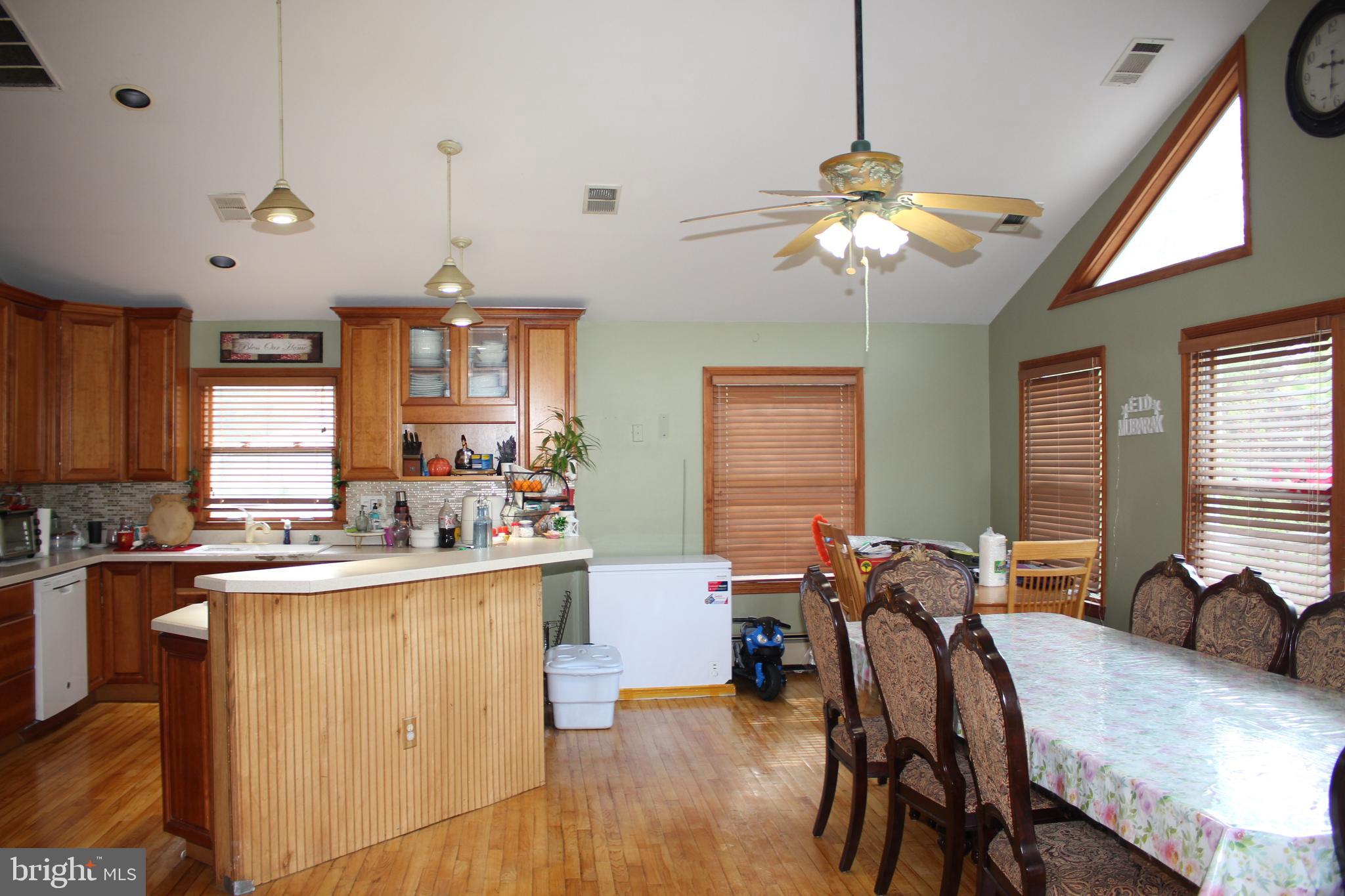 80 Chews Landing Road Clementon, NJ 08021 - Photo 41 of 50 a view of a dining room with furniture window and wooden floor