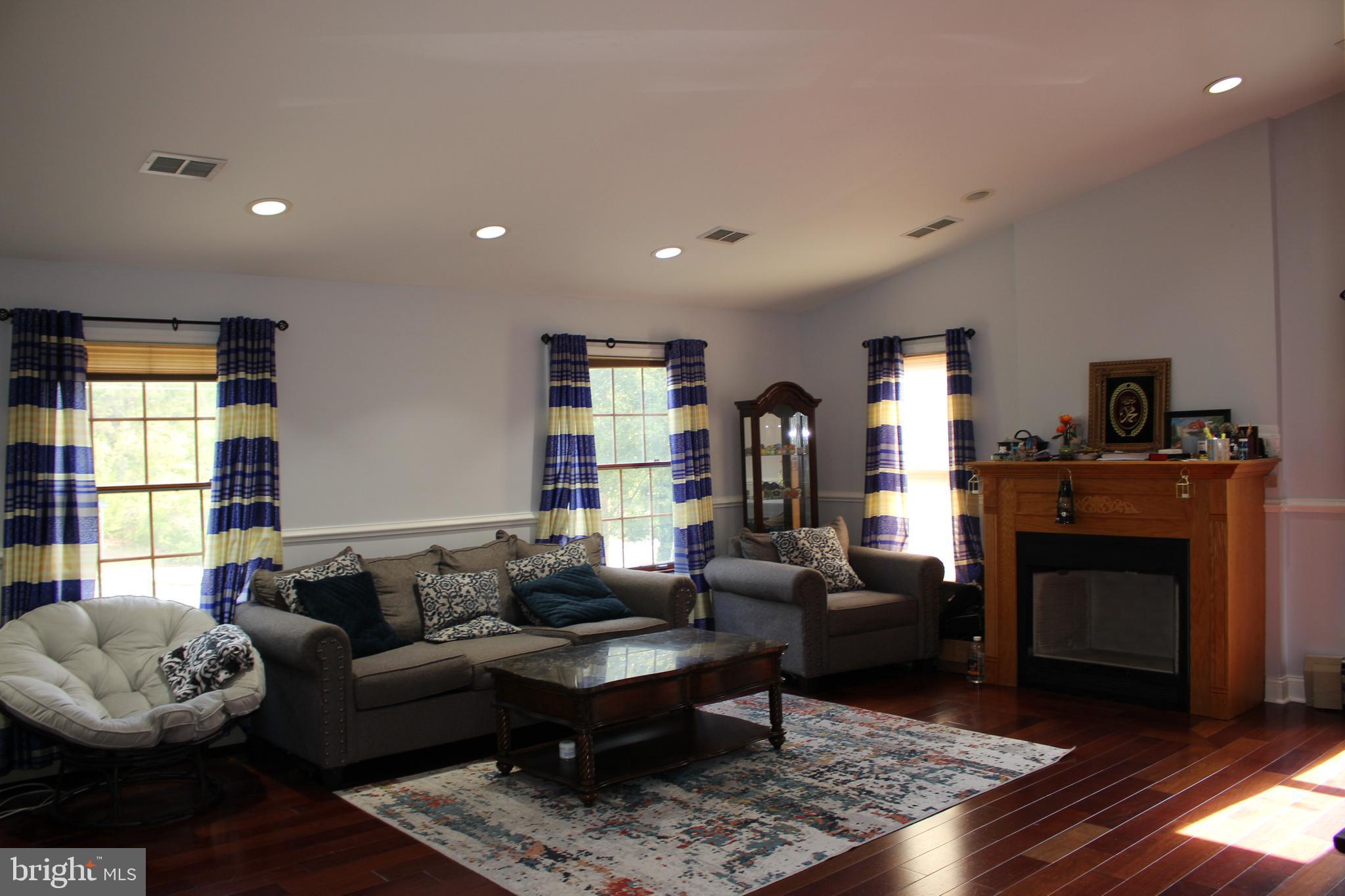 80 Chews Landing Road Clementon, NJ 08021 - Photo 45 of 50 a living room with furniture and a fireplace