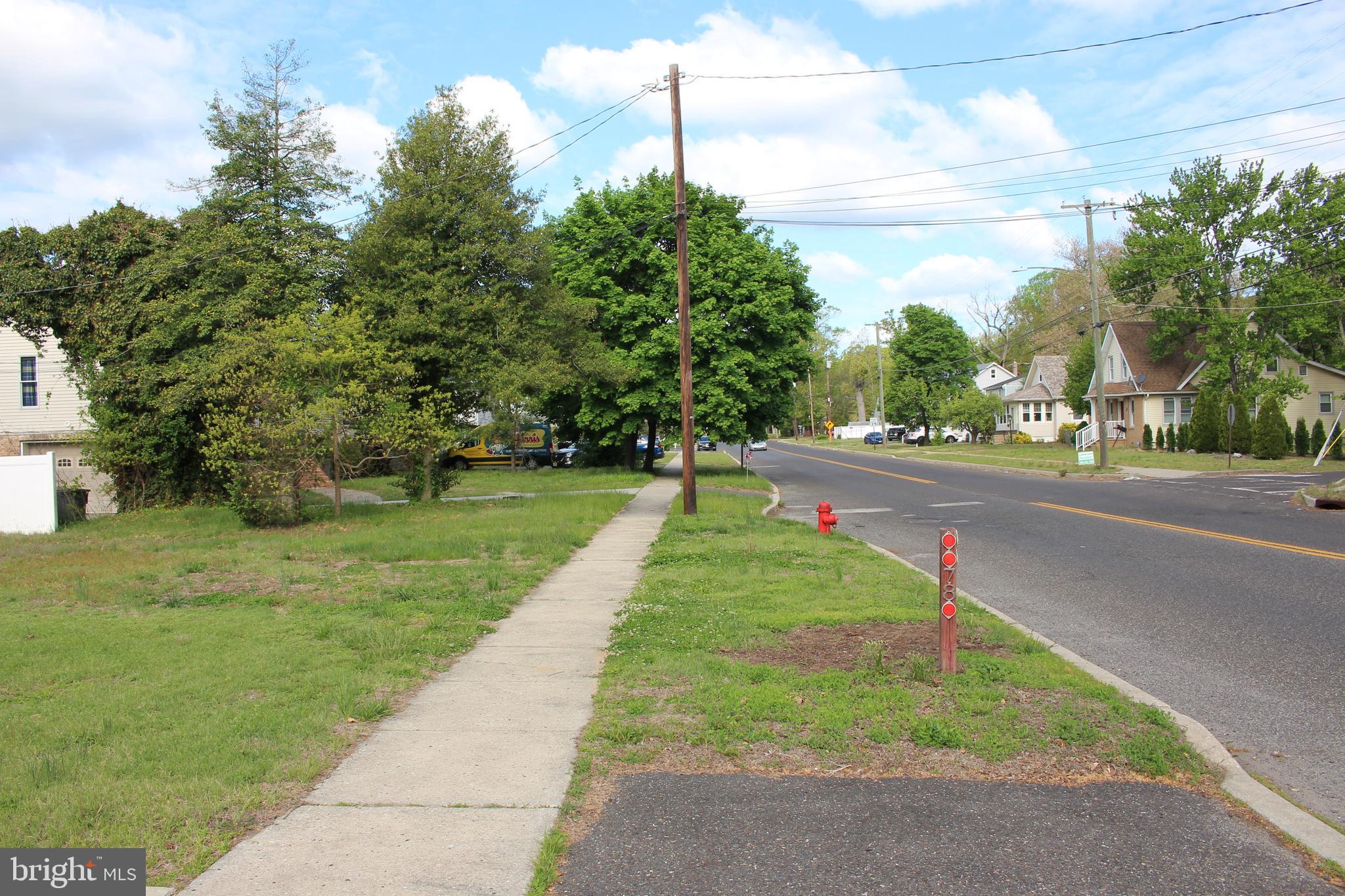 80 Chews Landing Road Clementon, NJ 08021 - Photo 50 of 50 a green field with lots of trees in the background