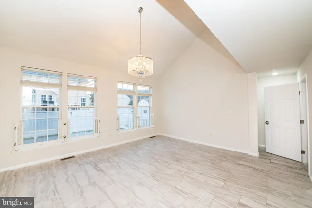 a view of a hallway with a staircase