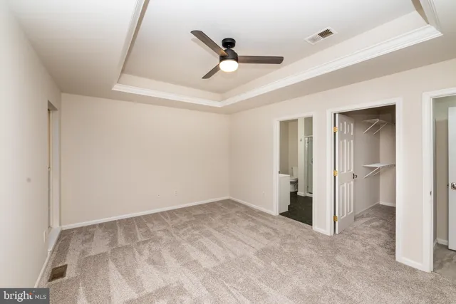 a view of an empty walk in closet