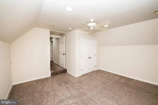 a bathroom with a bathtub and a sink