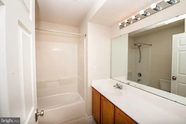 a view of a balcony with wooden floor