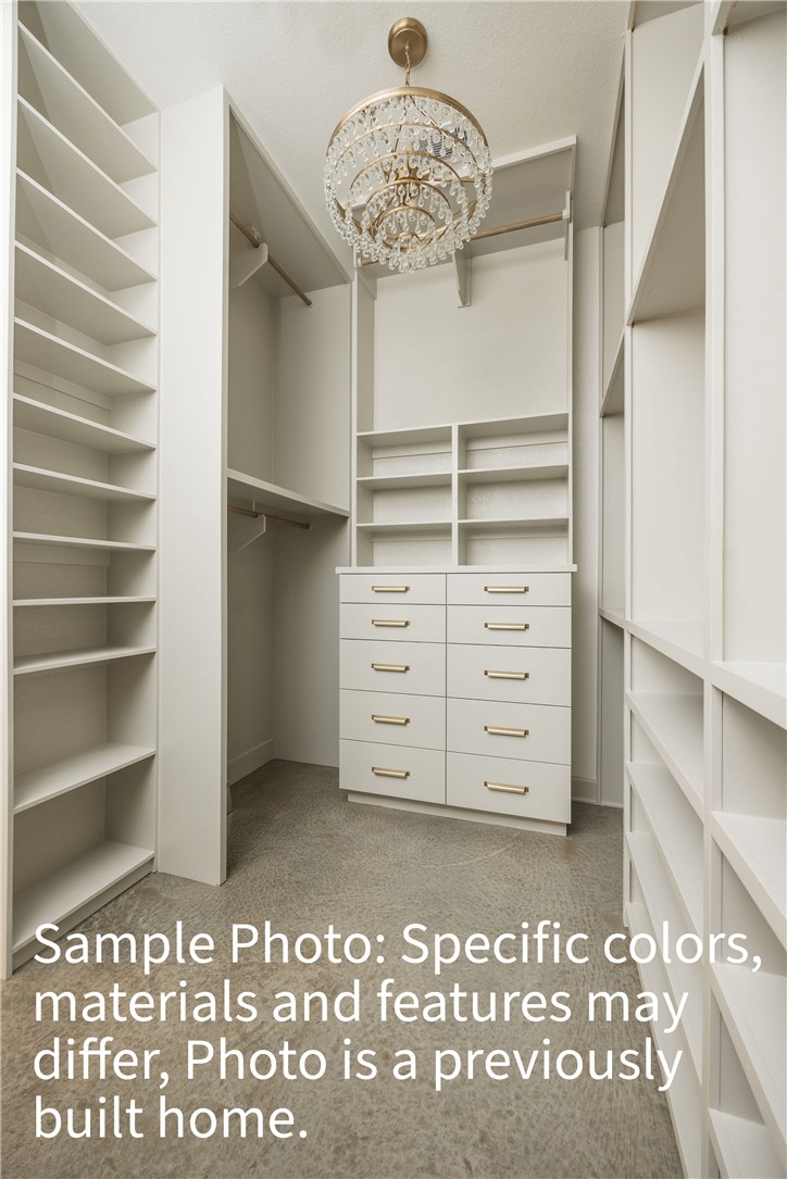 7048 Skipping Rock Path Bryan, TX 77808 - Photo 9 of 16 a view of walk in closet with empty racks