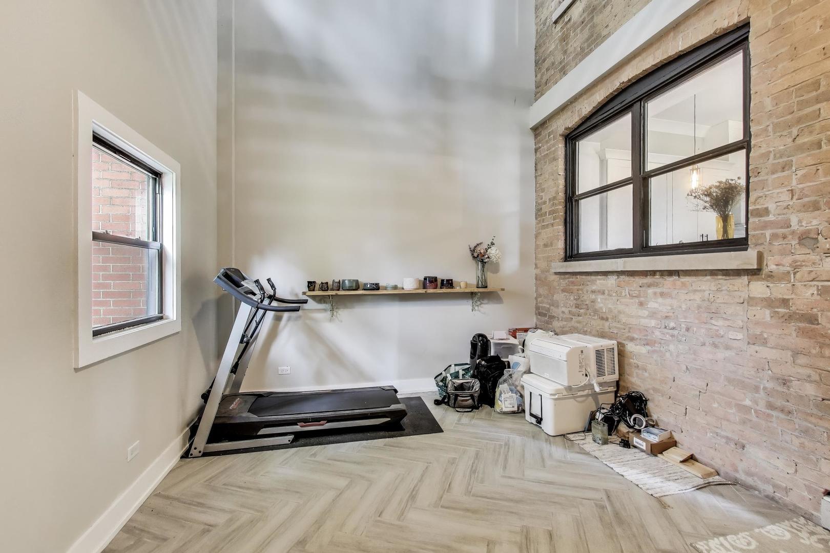 2742 West Polk Street Chicago, IL 60612 - Photo 11 of 50 a bathroom with a sink and a window