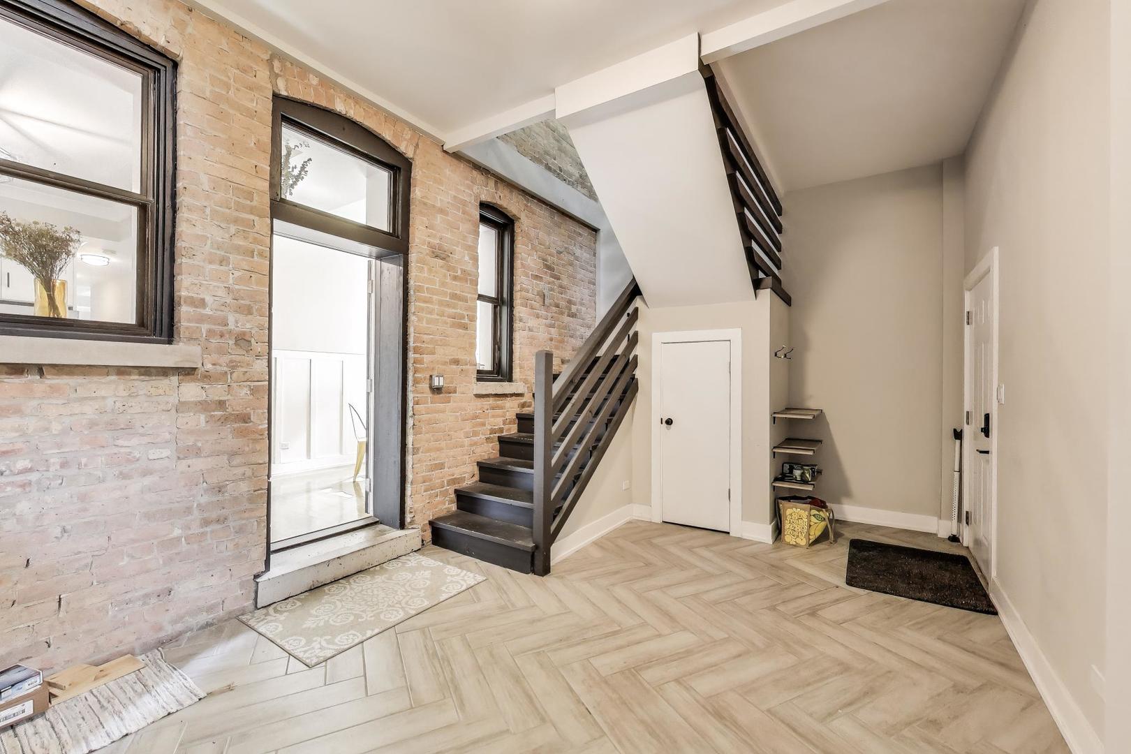 2742 West Polk Street Chicago, IL 60612 - Photo 12 of 50 a view of entryway and hall with wooden floor