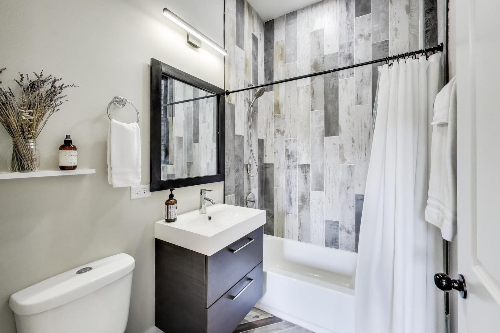 2742 West Polk Street Chicago, IL 60612 - Photo 13 of 50 a bathroom with a sink toilet and shower