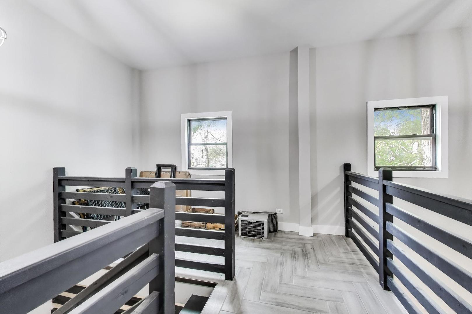 2742 West Polk Street Chicago, IL 60612 - Photo 26 of 50 a kitchen with a table and chairs