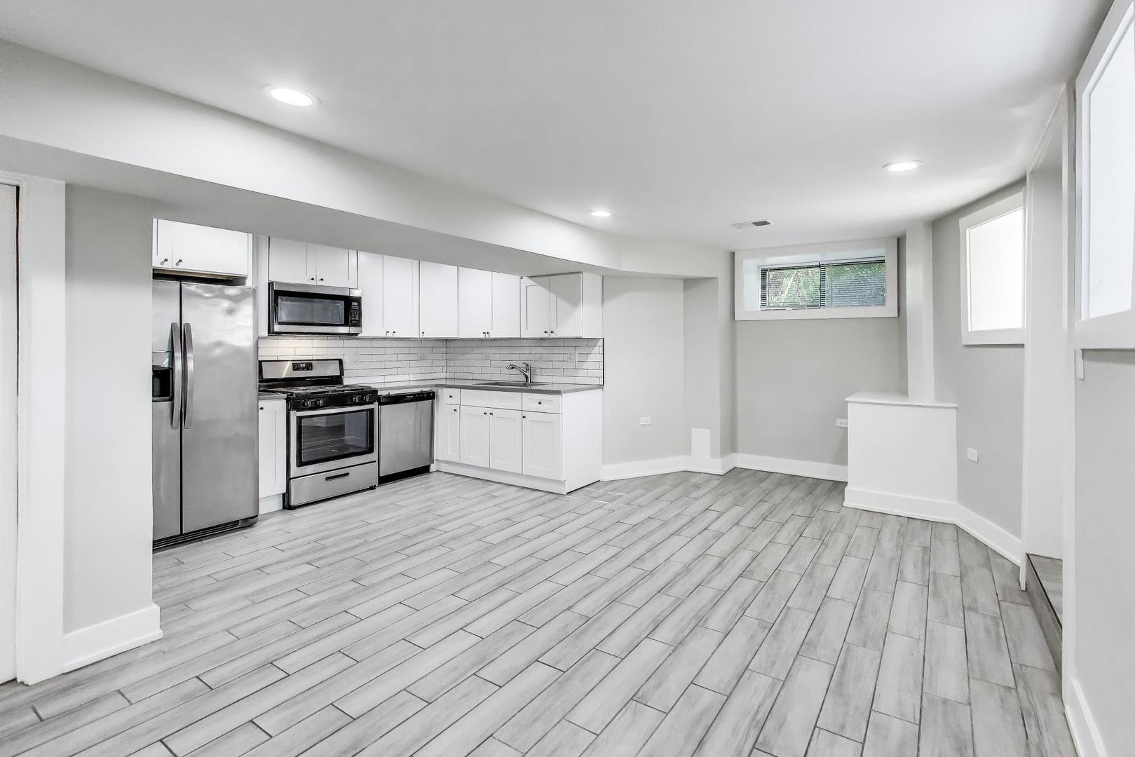 2742 West Polk Street Chicago, IL 60612 - Photo 29 of 50 a view of kitchen with microwave and refrigerator