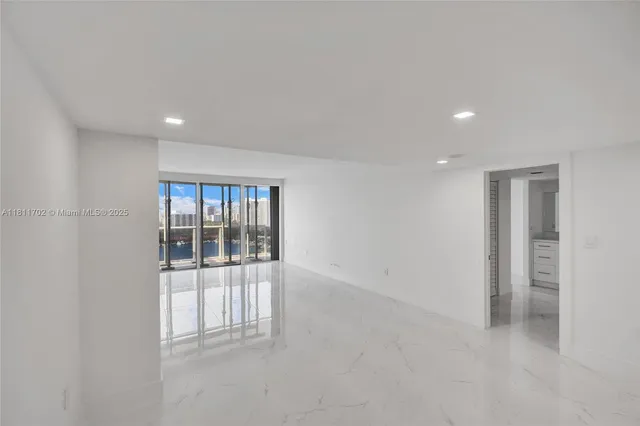 en empty room with windows