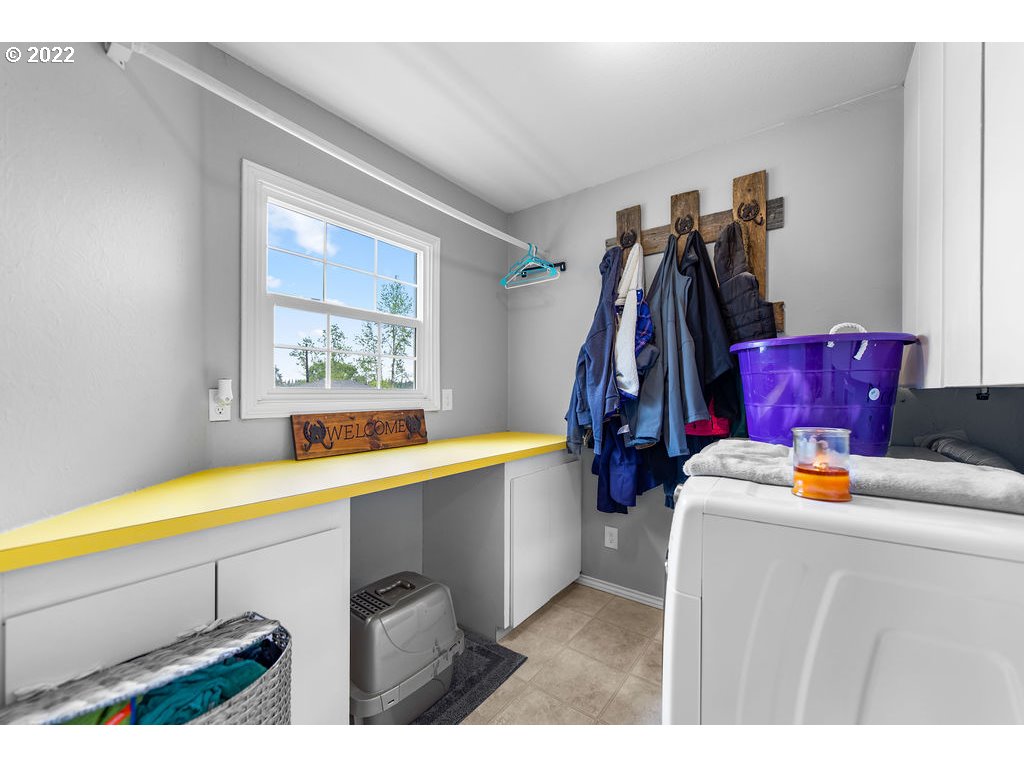 1908 North 4th Way Ridgefield, WA 98642 - Photo 23 of 32 a view of walk in closet with clothes and shoes