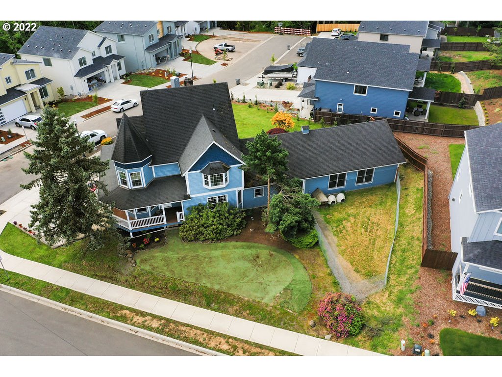 1908 North 4th Way Ridgefield, WA 98642 - Photo 27 of 32 an aerial view of residential houses with outdoor space and parking
