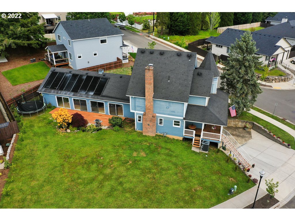 1908 North 4th Way Ridgefield, WA 98642 - Photo 28 of 32 a view of a house with a yard