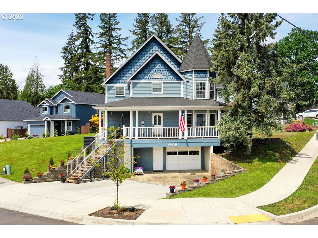 1908 North 4th Way Ridgefield, WA 98642 - Photo 31 of 32 a front view of a house with a yard