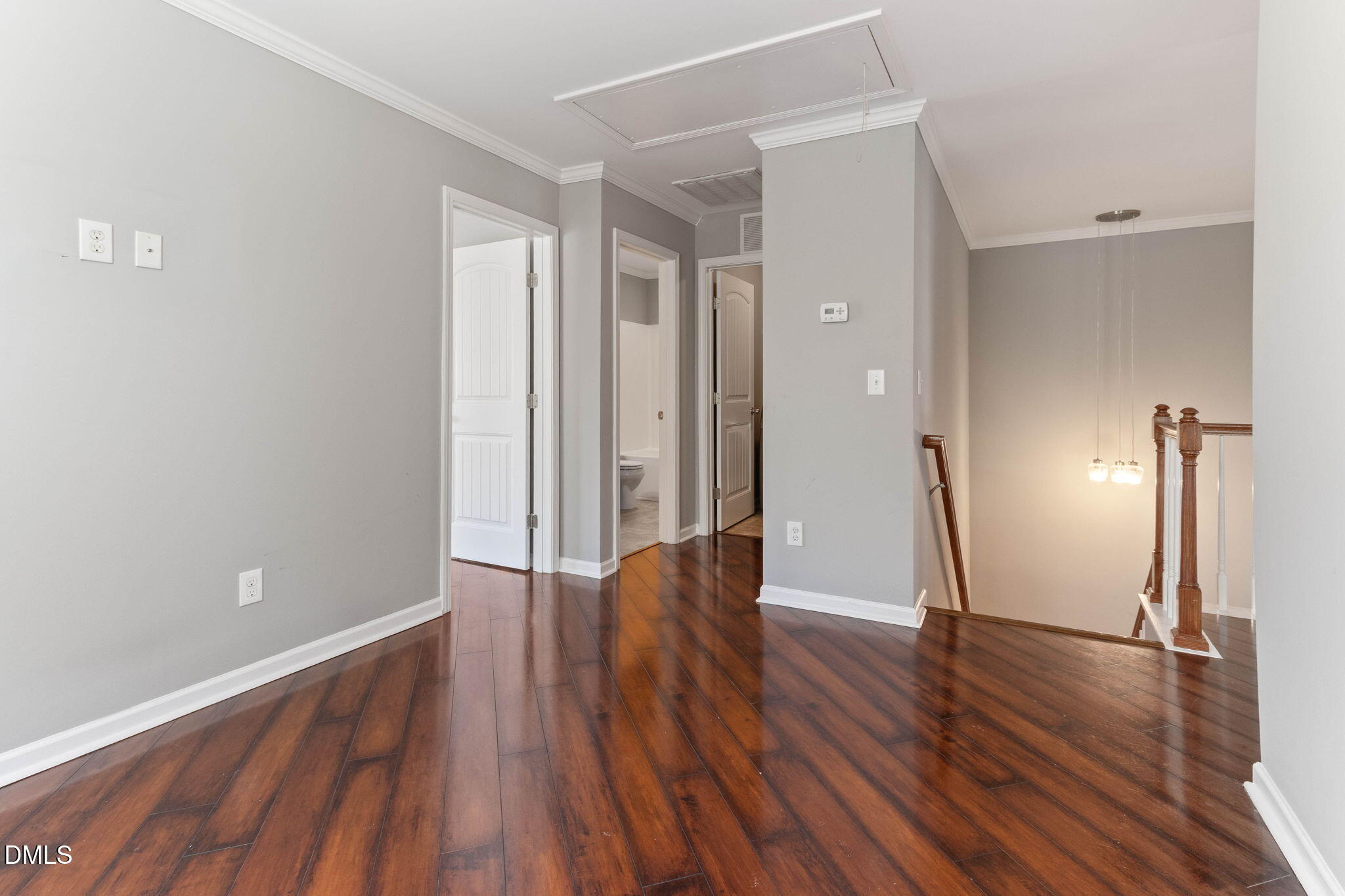 14303 Foxcroft Road Raleigh, NC 27614 - Photo 26 of 70 a view of empty room with wooden floor