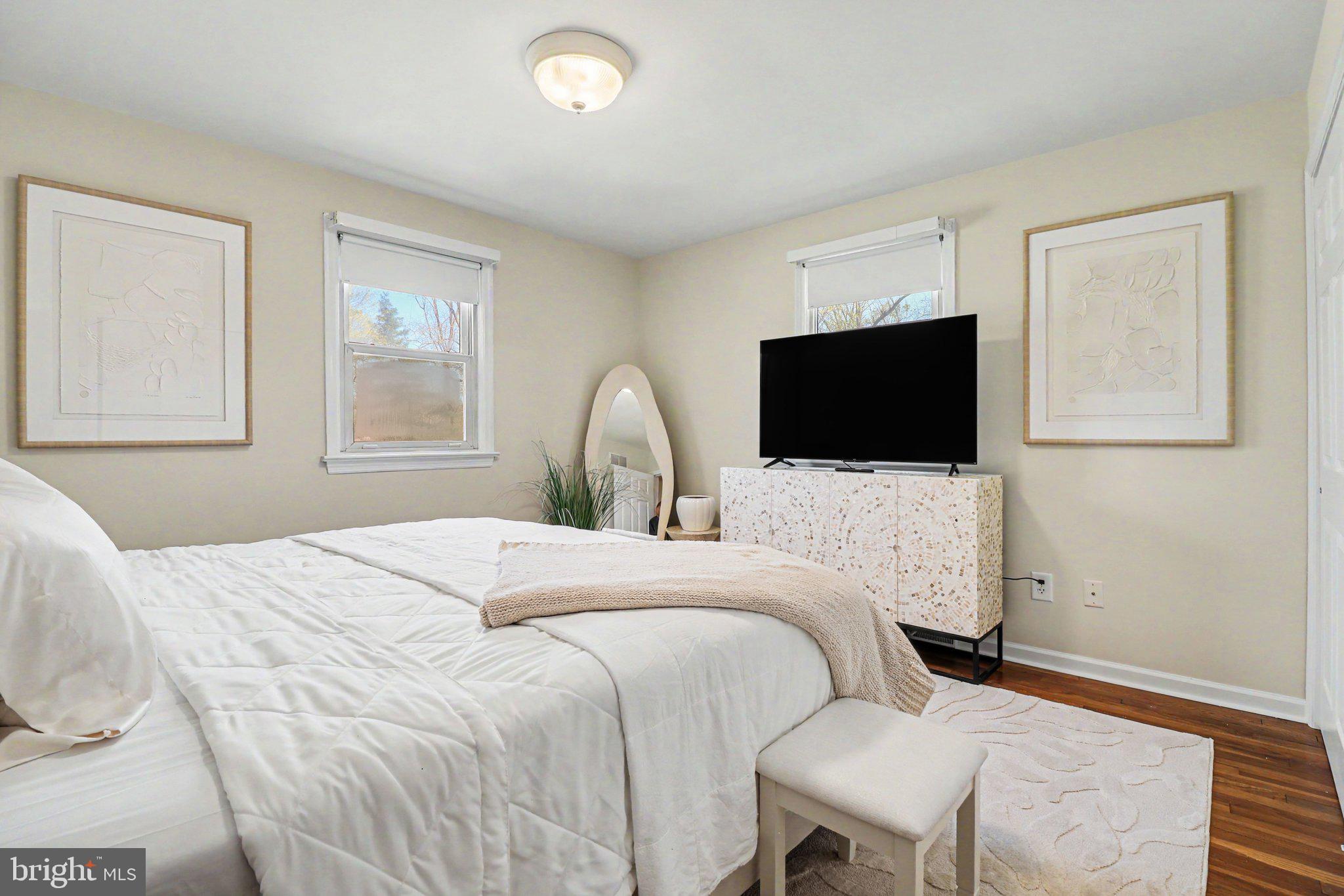 913 Stehman Road Millersville, PA 17551 - Photo 12 of 38 a bedroom with a bed tv and window