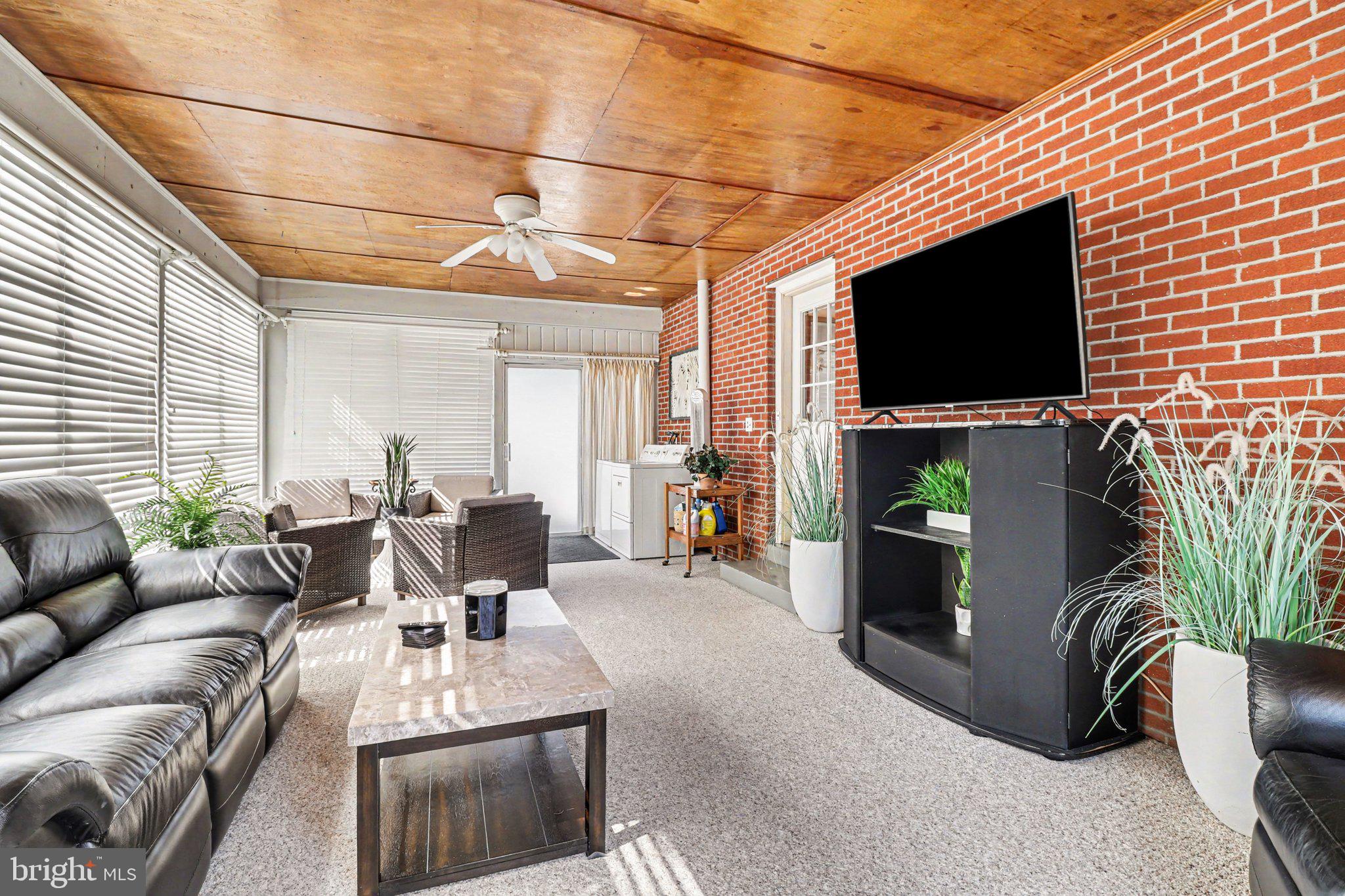 913 Stehman Road Millersville, PA 17551 - Photo 19 of 38 a living room with furniture and a flat screen tv