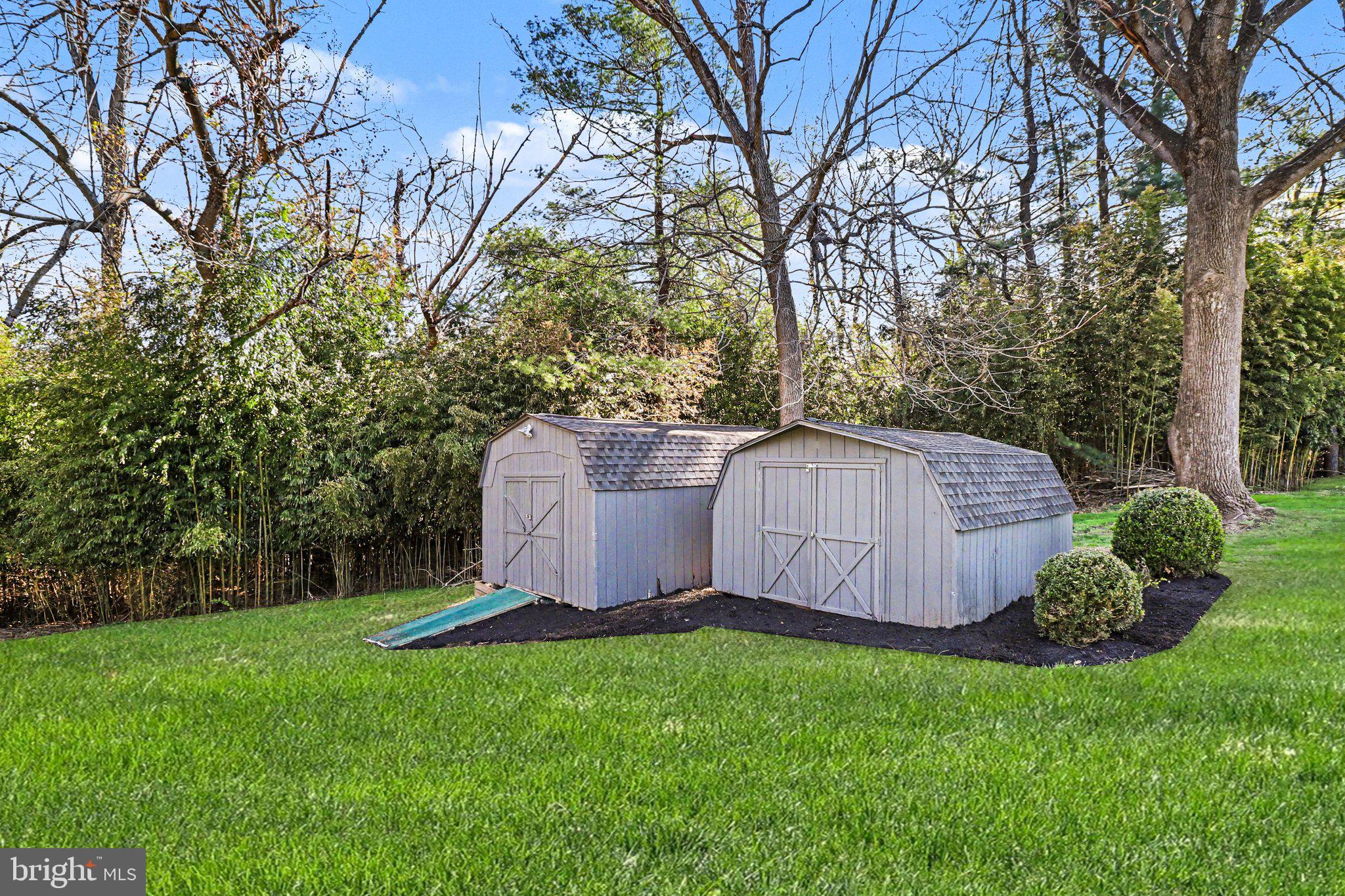 913 Stehman Road Millersville, PA 17551 - Photo 27 of 38 a view of a backyard with potted plants and large trees