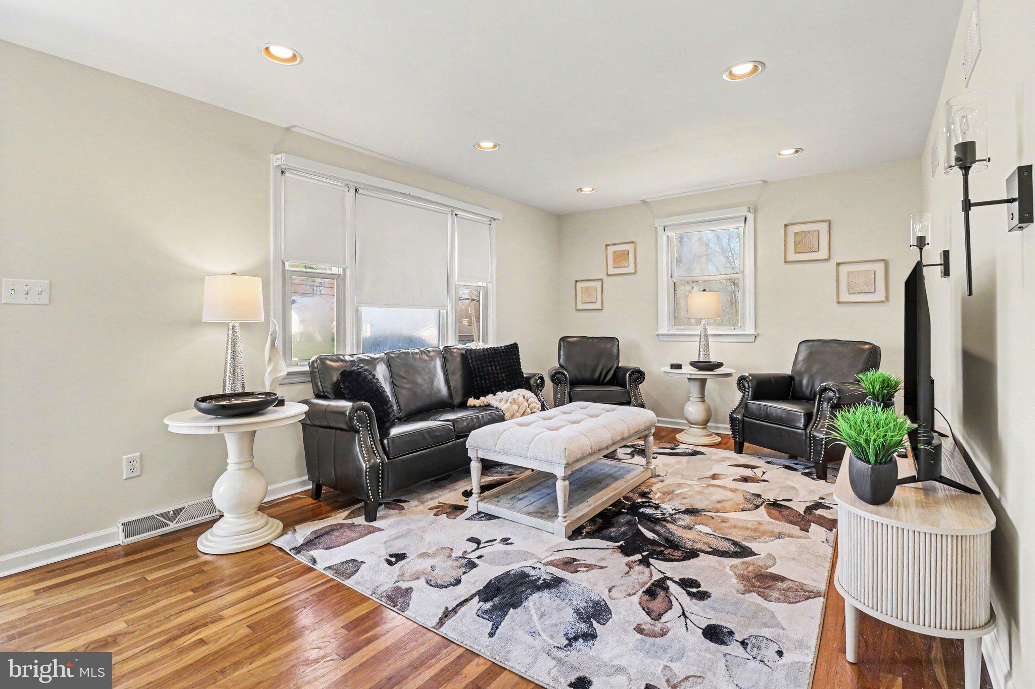 913 Stehman Road Millersville, PA 17551 - Photo 3 of 38 a living room with furniture wooden floor and a flat screen tv