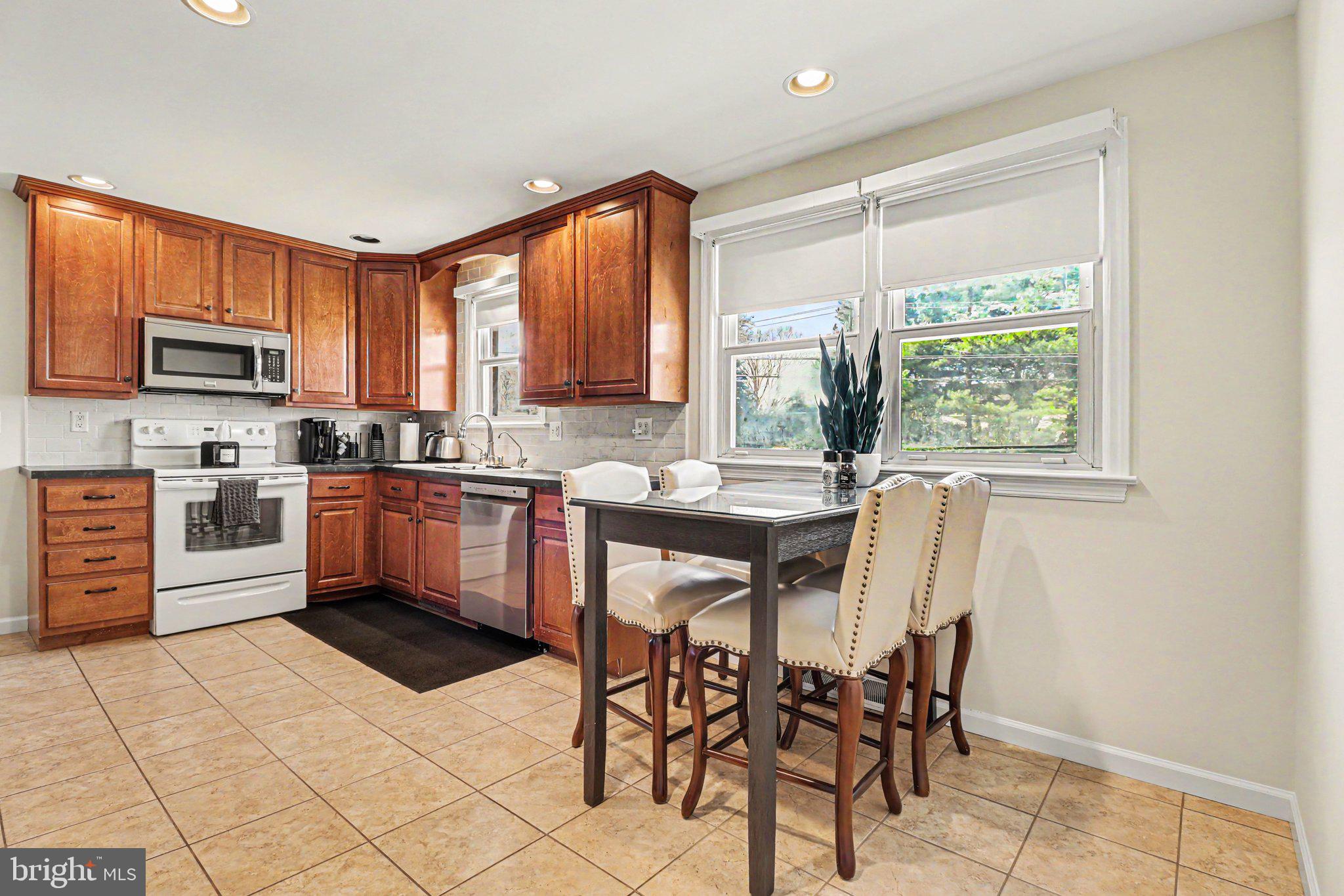 913 Stehman Road Millersville, PA 17551 - Photo 5 of 38 a kitchen with a stove a sink and a refrigerator