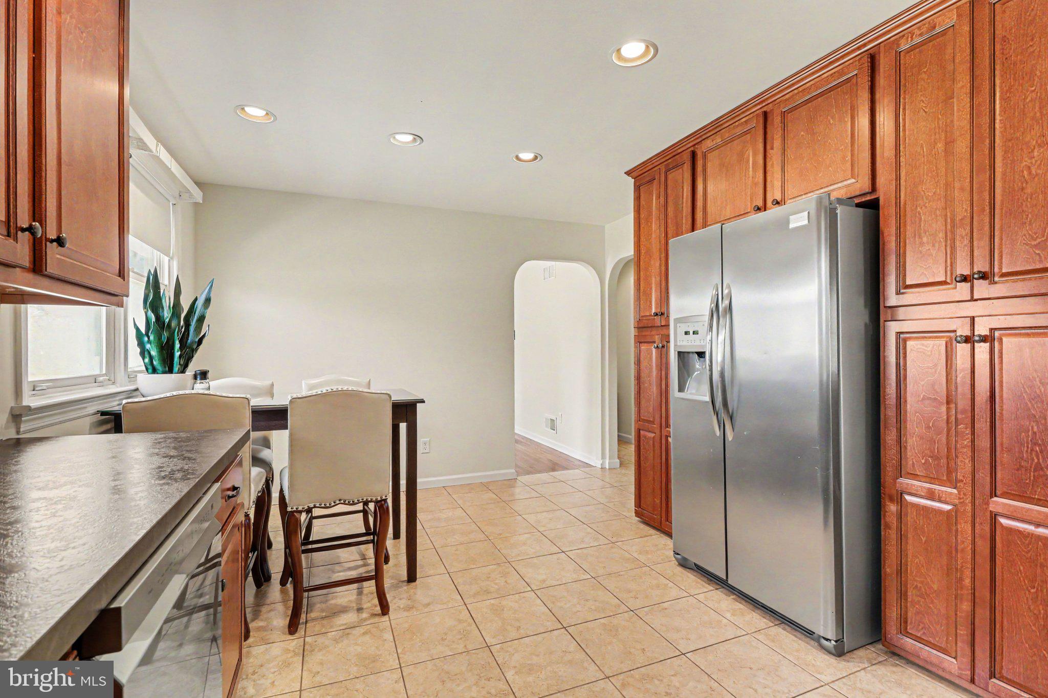 913 Stehman Road Millersville, PA 17551 - Photo 8 of 38 a kitchen with stainless steel appliances granite countertop a refrigerator and a sink
