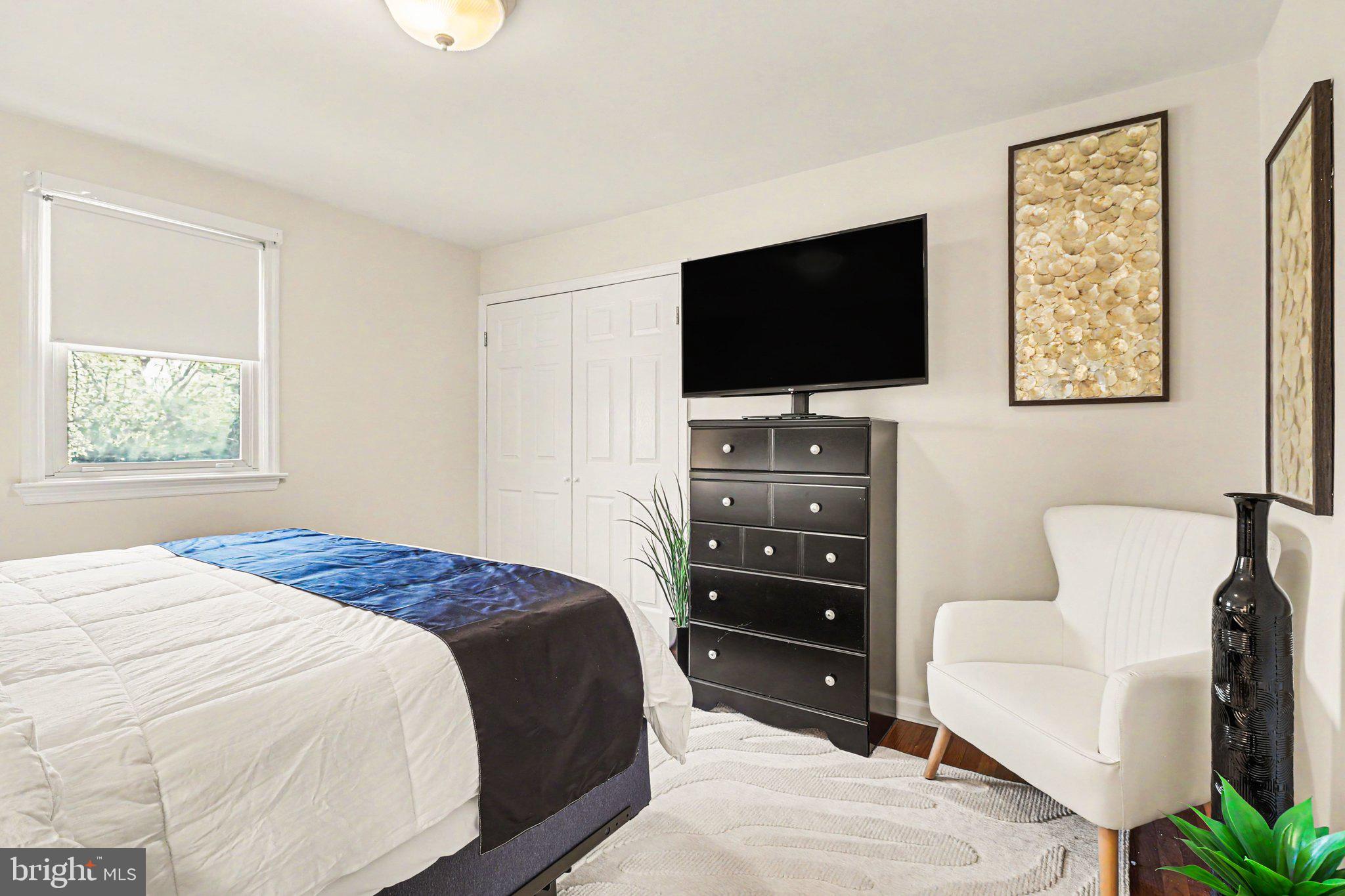 913 Stehman Road Millersville, PA 17551 - Photo 10 of 38 a bedroom with a bed and a television