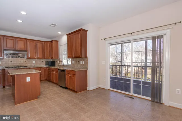 a view of wooden balcony with wooden floor