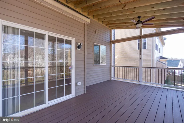 a view of a wooden roof deck