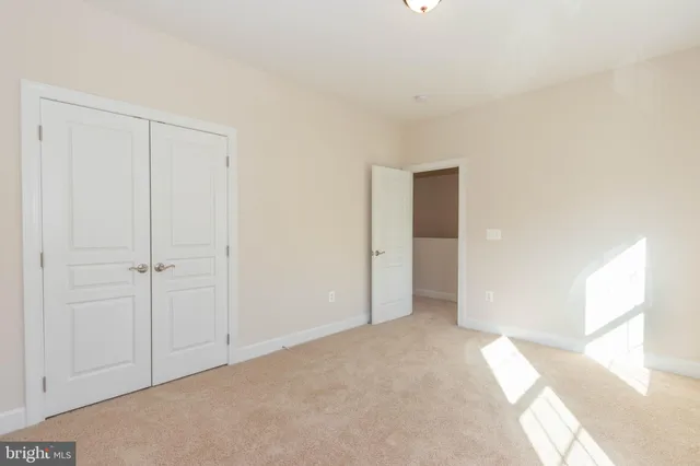 a bathroom with a double vanity sink and mirror
