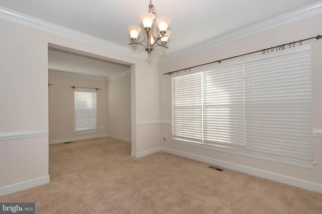 a view of a livingroom with a staircase