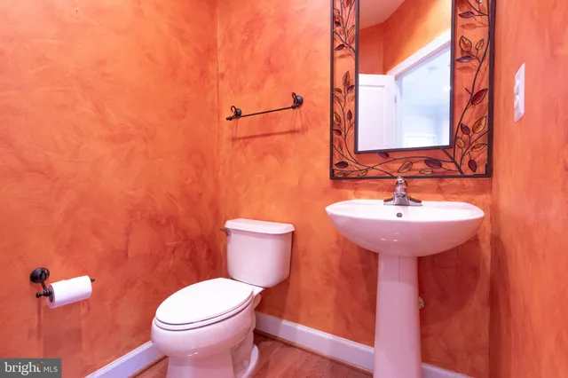 a kitchen with stainless steel appliances granite countertop a stove refrigerator sink and cabinets