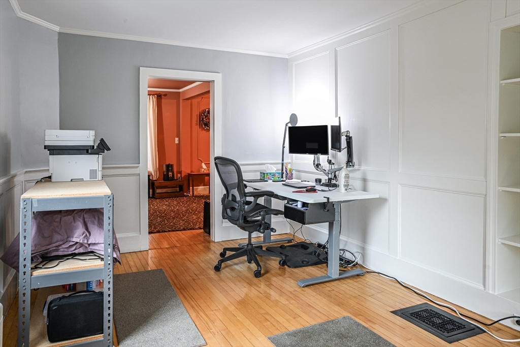 42 Bisson Street Beverly, MA 01915 - Photo 13 of 28 a workspace with furniture and a window